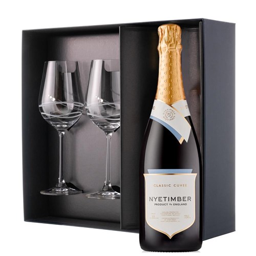 This luxurious gift set is the perfect choice for those who appreciate fine sparkling wine and refined glassware. Featuring a bottle of Nyetimber Classic Cuvee 75cl paired with two exquisite Venezia Glasses adorned with Swarovski Crystals, this set is beautifully presente